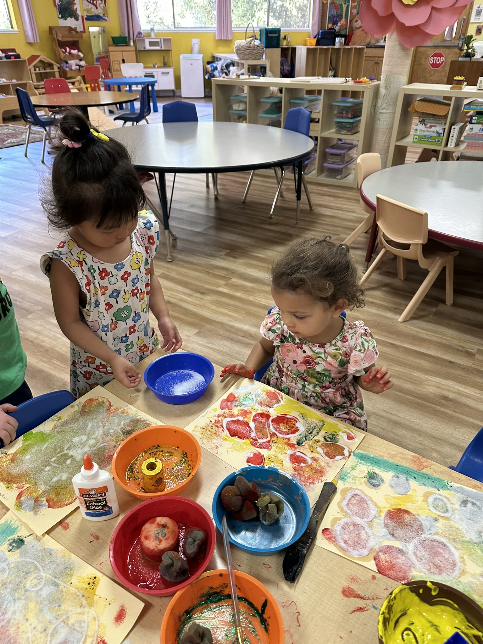 Children creating art together at Butterflies Academy